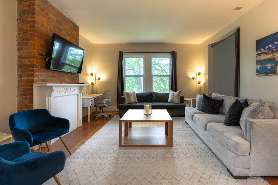 Unit 2 living room, with multiple seating options for gathering