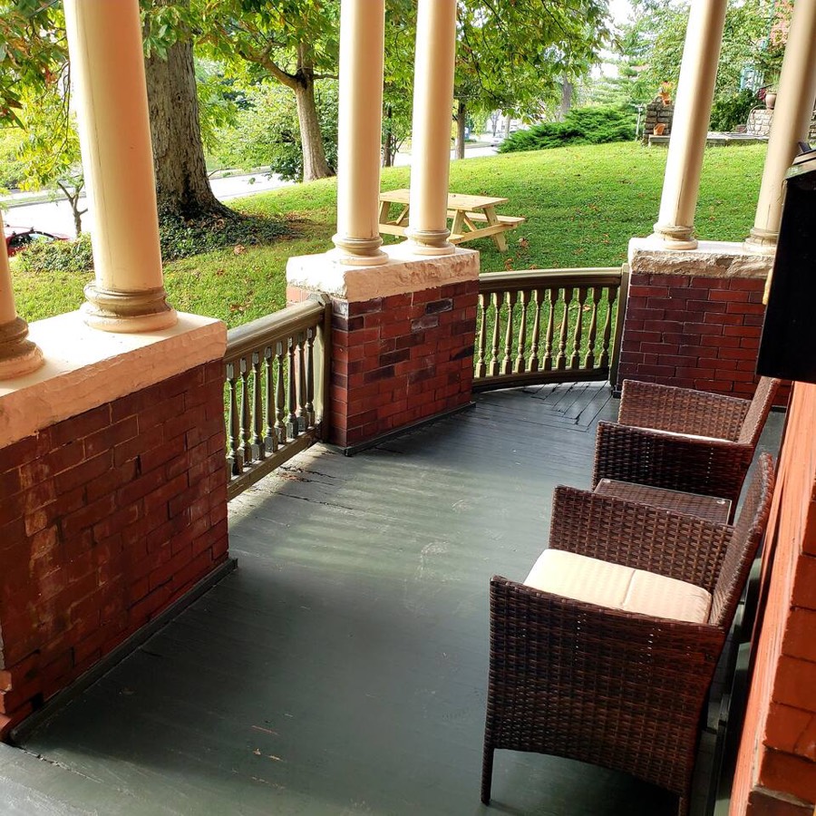 Outdoor seating, including the front porch and picnic table