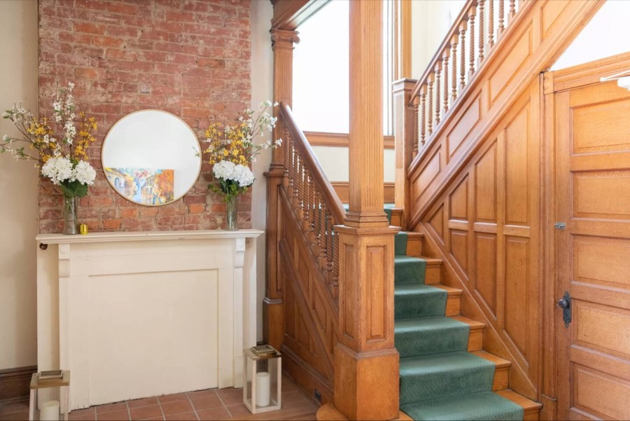 Original Victorian woodwork in the building's foyer